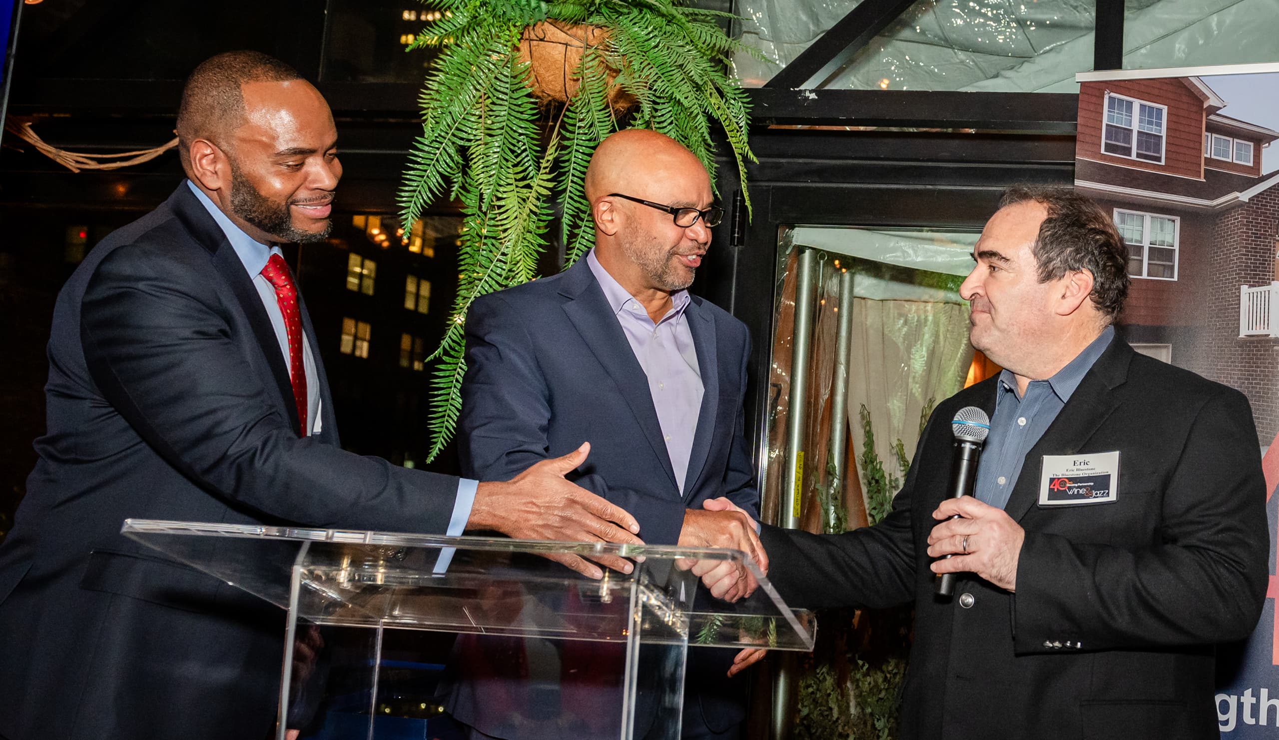 HP President & CEO Jamie Smarr with NYC HPD Commissioner Adolfo Carrion, Jr. presents Eric Bluestone of the Bluestone Organization with a Founding Partners award.